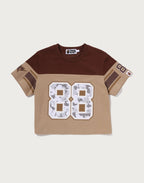 MULTI LOGO FOOTBALL BOXY CROPPED TEE LADIES