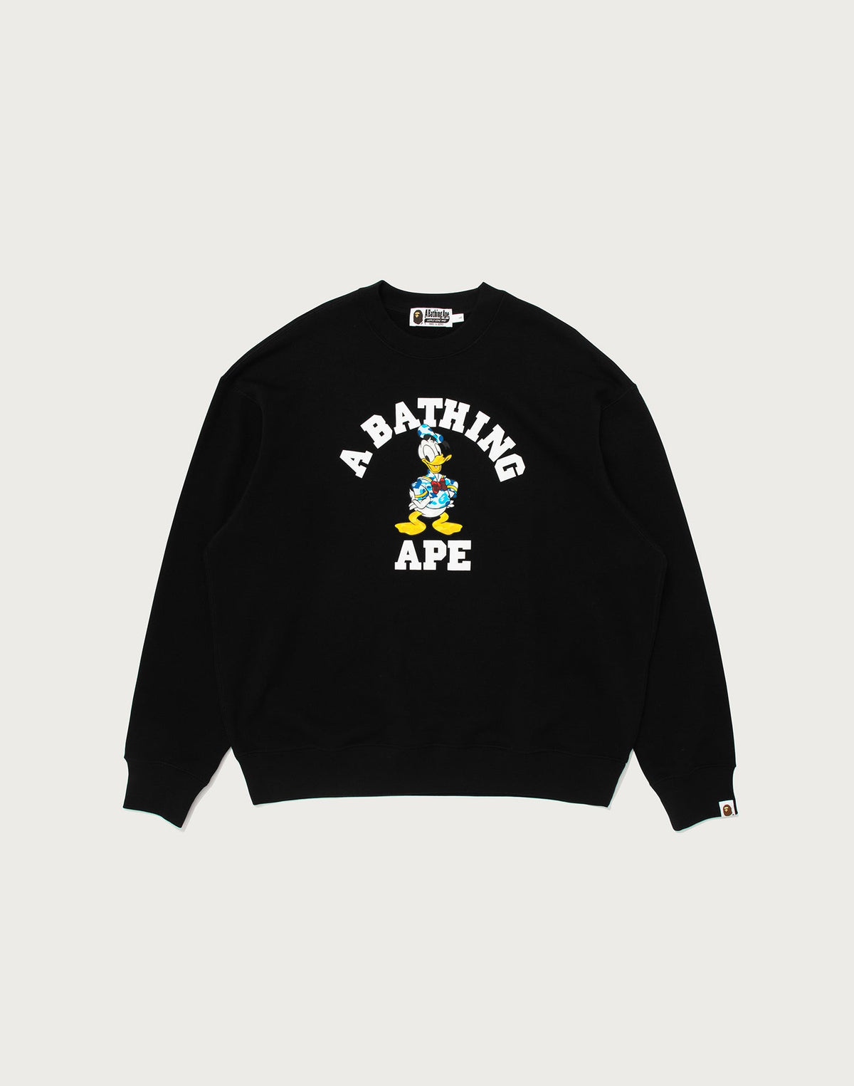 BAPE X DISNEY DONALD DUCK COLLEGE RELAXED FIT CREWNECK MENS